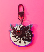 Load image into Gallery viewer, Live Laugh Loathe Mothman cryptid Rainbow Holographic Keychain!